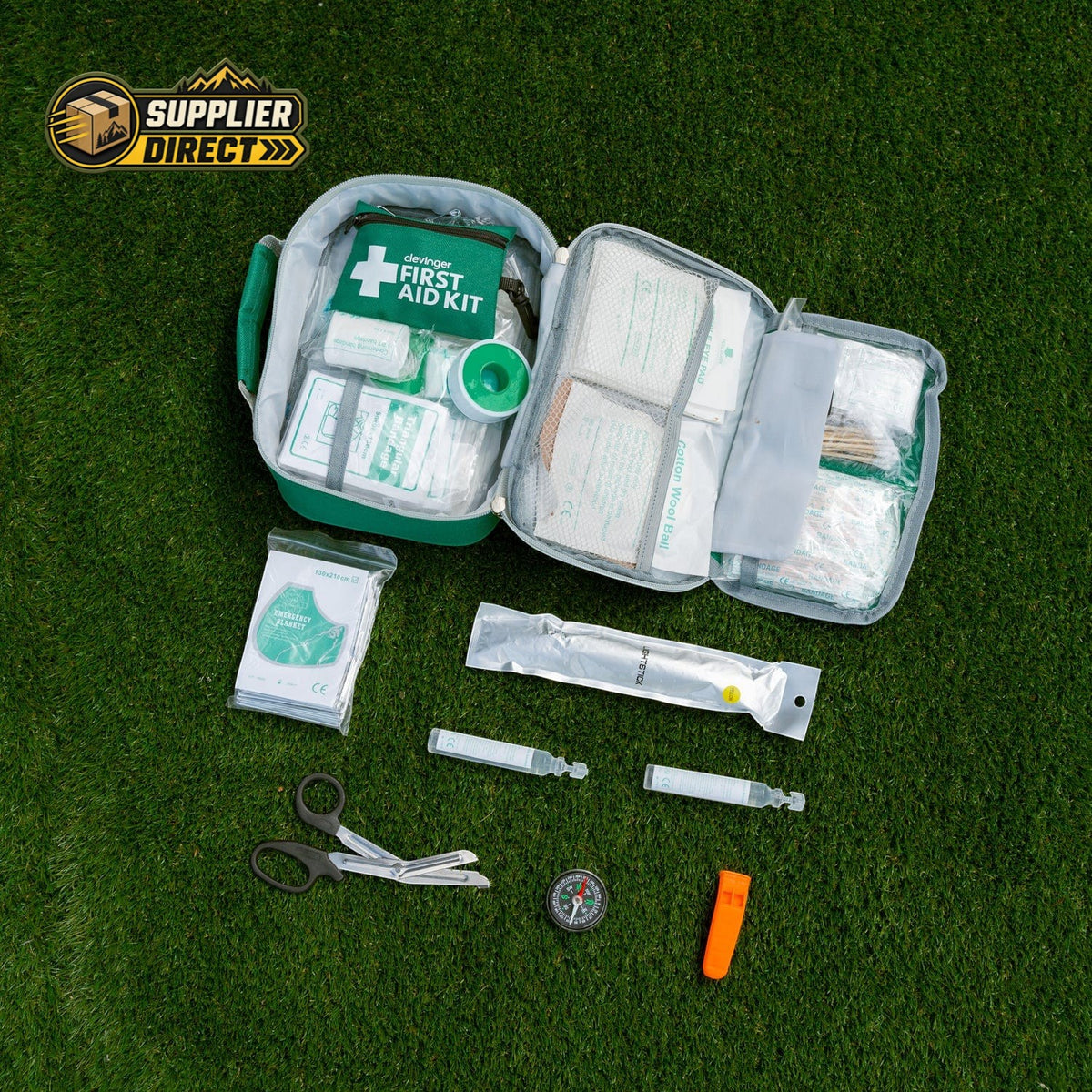 PrepPro Australia 516-piece 2-in-1 emergency first aid kit with medical supplies laid out on green grass