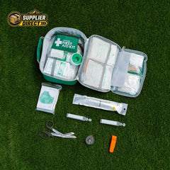 PrepPro Australia 516-piece 2-in-1 emergency first aid kit with medical supplies laid out on green grass