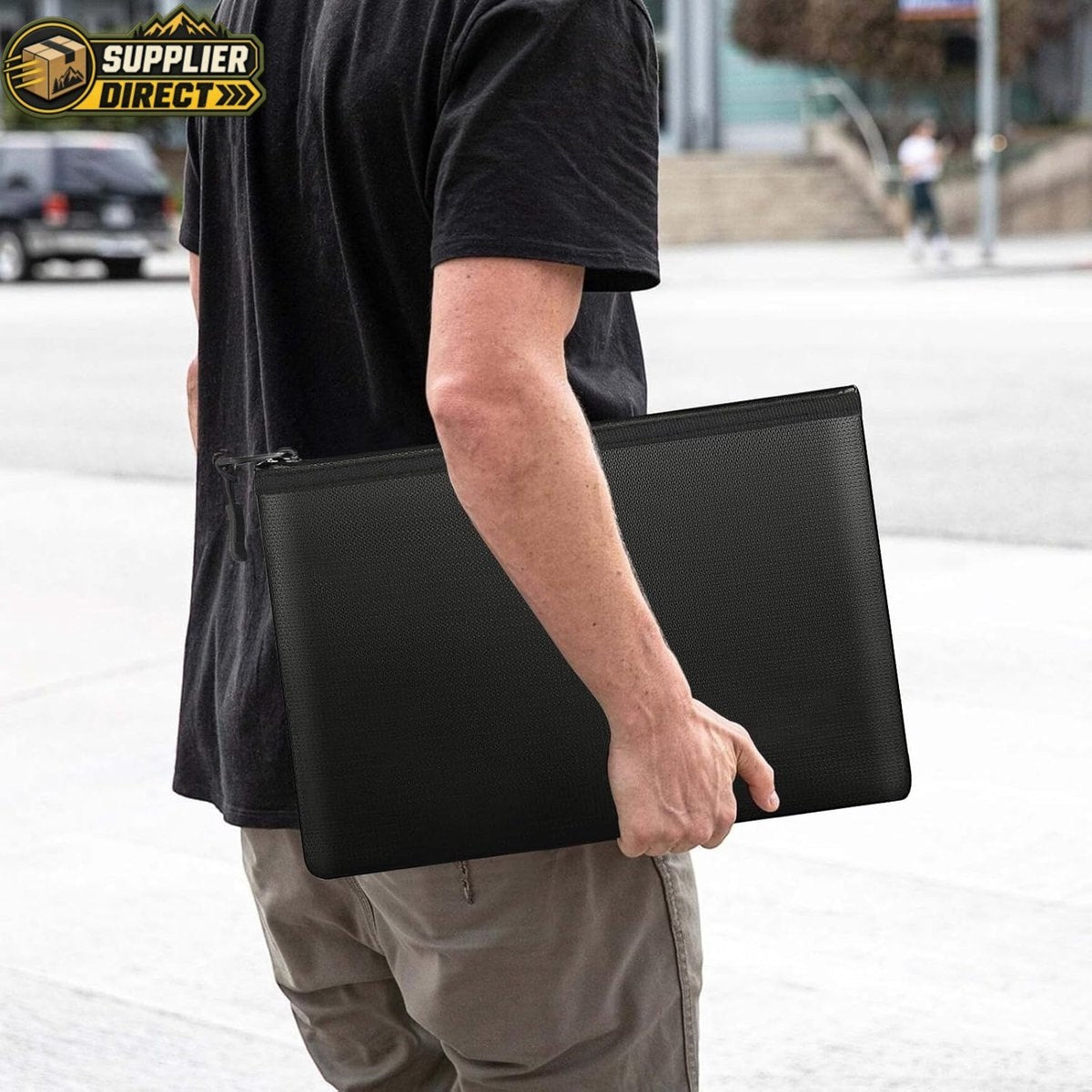 PrepPro Australia fireproof and waterproof document bag in black, held by a person for emergency document protection.