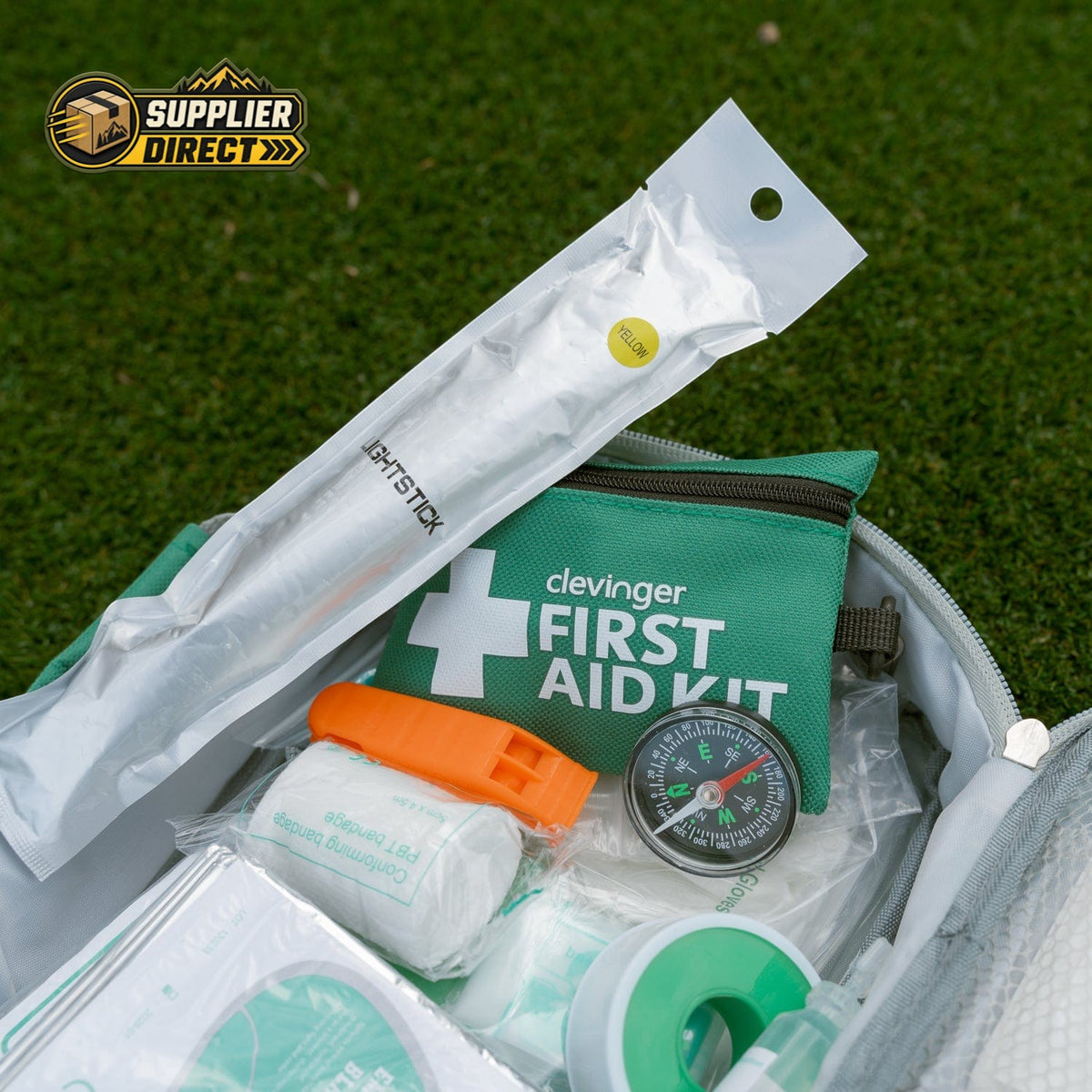 PrepPro Australia 516 piece first aid kit featuring a green portable pouch, compass, orange whistle, and lightstick.