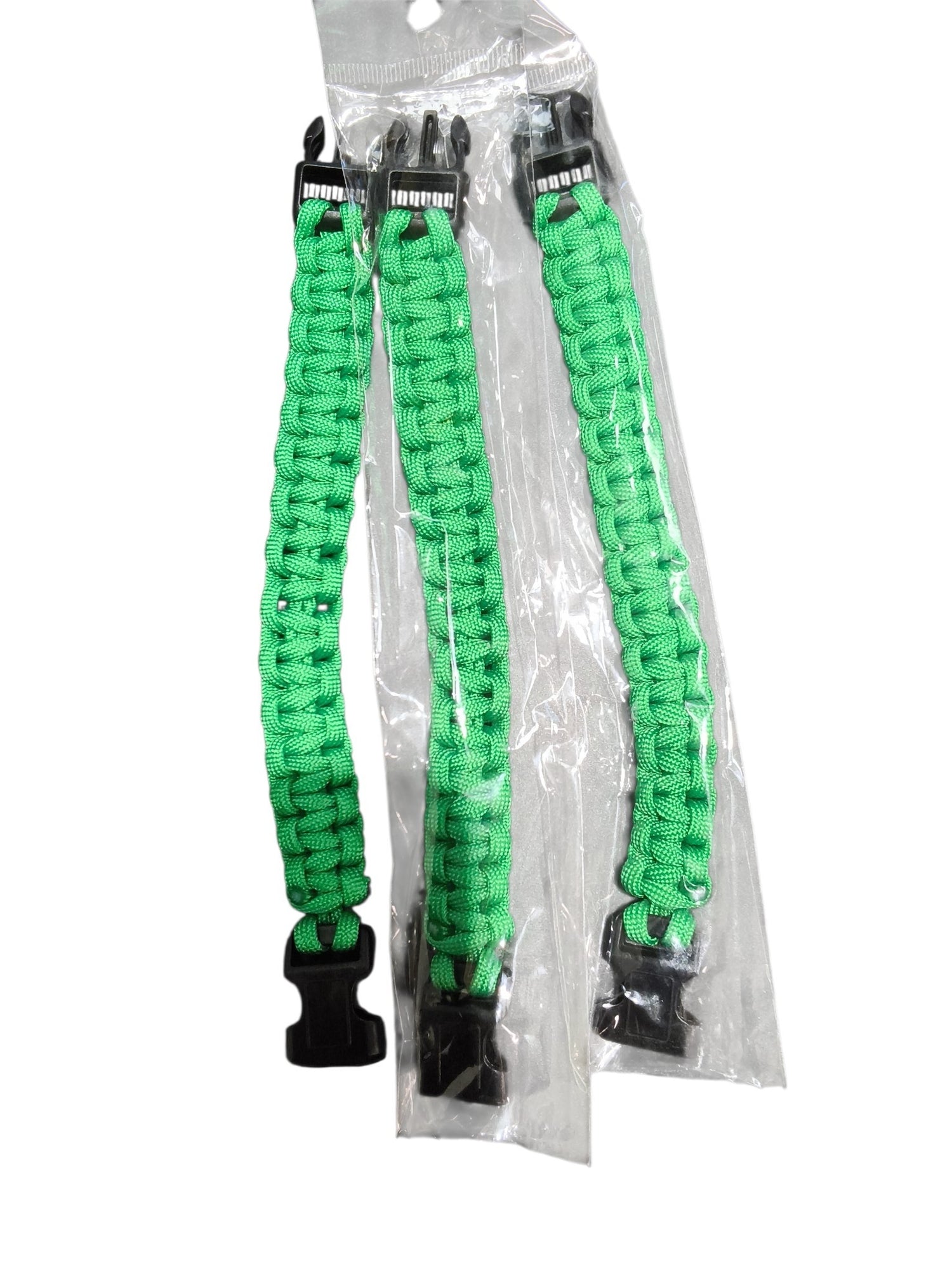 Three bright green PrepPro Australia paracord survival bracelets in plastic packaging with black side-release buckles.