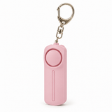 Pink personal alarm keyring with LED light on a white background